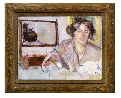 Woman in front of a mirror by Spencer Frederick Gore
